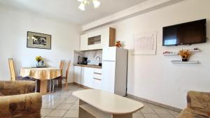 Kuchyň nebo kuchyňský kout v ubytování Apartman Merima