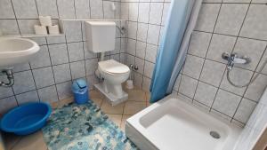 Koupelna v ubytování Apartman Merima + 37 fotografií