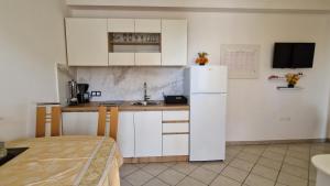 Kuchyň nebo kuchyňský kout v ubytování Apartman Merima