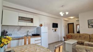 Kuchyň nebo kuchyňský kout v ubytování Apartman Merima