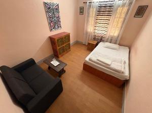 Letto o letti in una camera di DRAKON NEST HOMESTAY