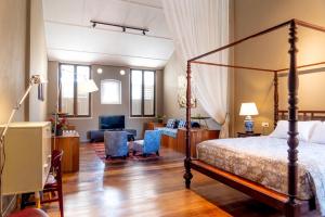 a bedroom with a bed and a living room at Argus Residences in George Town +21 photos