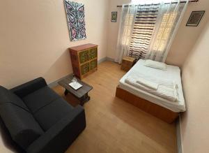 Letto o letti in una camera di DRAKON NEST HOMESTAY
