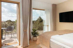 Postel nebo postele na pokoji v ubytování Color Hotel Skagen + 37 fotografií