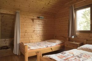 Postel nebo postele na pokoji v ubytování Chata Vičanov