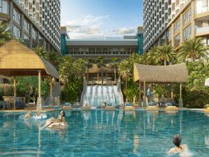 Bazén v ubytování Cactos Inn Apartment APEC Mandala Cham Bay Mui Ne nebo v jeho okolí