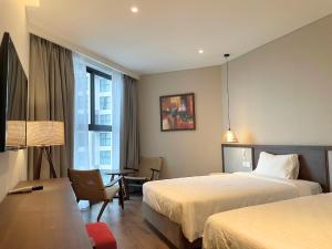 Postel nebo postele na pokoji v ubytování Cactos Inn Apartment APEC Mandala Cham Bay Mui Ne + 22 fotografií