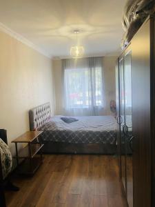 Ένα ή περισσότερα κρεβάτια σε δωμάτιο στο Kobuleti center - Near the sea