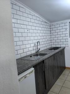 Η κουζίνα ή μικρή κουζίνα στο EasyStay Hideaway