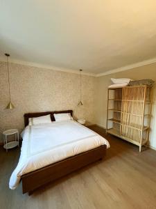 Posteľ alebo postele v izbe v ubytovaní BelAbrì - central charme&comfort -mansarde e appartamento