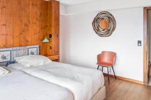 Voodi või voodid majutusasutuse Between Boutique Hotel toas