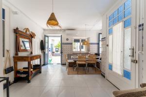 a hallway with a dining room with a table at House in the center of Tossa de Mar in Tossa de Mar