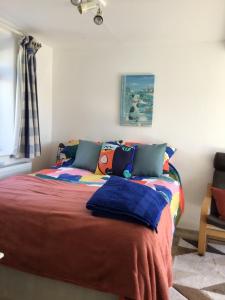 Katil atau katil-katil dalam bilik di Farm Apartment