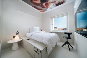 Posteľ alebo postele v izbe v ubytovaní Maistra City Vibes Stellar Boutique Modules + 16 fotografií