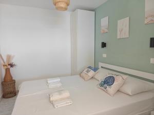 Postel nebo postele na pokoji v ubytování Apartments Maskovic Karbuni