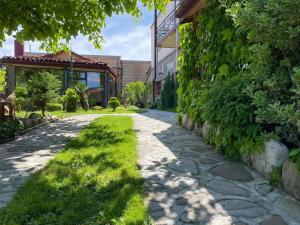 Zahrada ubytování Guest House Sanapiro