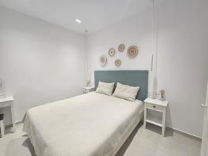 Ένα ή περισσότερα κρεβάτια σε δωμάτιο στο Gem apartment 2