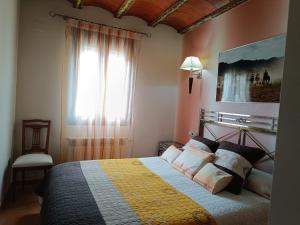 Cama o camas de una habitación en Posada Peñarubia
