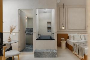Letto o letti in una camera di Luxury Suites by Lato