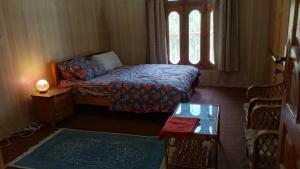 Postel nebo postele na pokoji v ubytování Stay in Skardu
