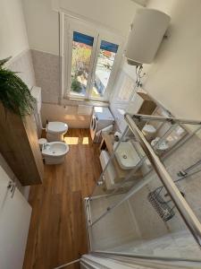 an overhead view of a bathroom with two toilets at Sul Mare - da Angelica in Termoli