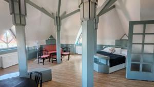 Postel nebo postele na pokoji v ubytování Abbázia Club Hotel Kék