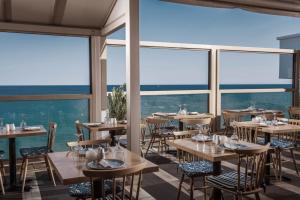 Restaurace v ubytování Enorme Serenity Spritz - Adults Only