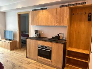 A kitchen or kitchenette at Dining & Living Alpenrose