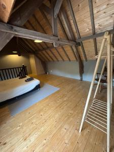 Llit o llits en una habitació de Hoeve schoneborg 2 fotos més
