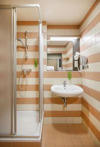 Koupelna v ubytování JUFA Hotel Mariazell