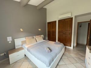 Posteľ alebo postele v izbe v ubytovaní "La villa Mariam" Jacuzzi Piscine Jardin Pétanque
