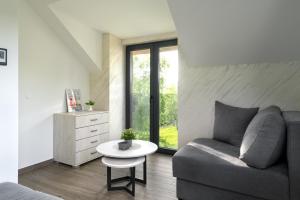 Predel za sedenje v nastanitvi Vision apartmani Goč