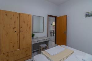 Postel nebo postele na pokoji v ubytování Beachside Apartment-1