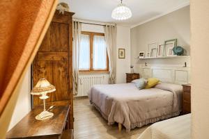 Postel nebo postele na pokoji v ubytování Villa PoliFlora