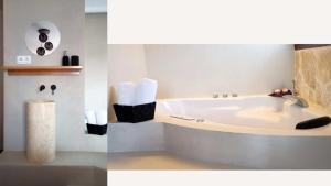 a bathroom with a bath tub in a room at La Pintada Casa Rural in Cañícosa +10 photos