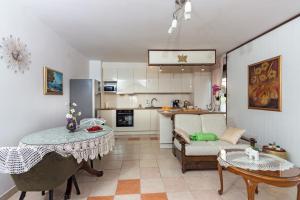 Kuchyňa alebo kuchynka v ubytovaní Apartments Cordis