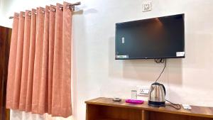 TV o dispositivi per l'intrattenimento presso Manya Palace