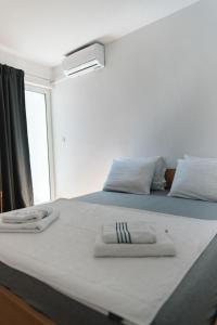 Postel nebo postele na pokoji v ubytování Great View Apartment + 39 fotografií