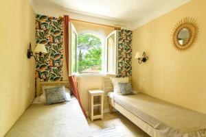 Postel nebo postele na pokoji v ubytování Village Le Rouret - maison avec piscines partagées