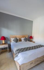 Postel nebo postele na pokoji v ubytování Adi Guest House