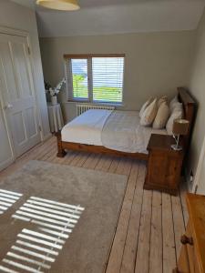 Postel nebo postele na pokoji v ubytování Mardan House B&B