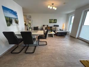 Posezení v ubytování Aquamarin Ostseetraumsuite 02