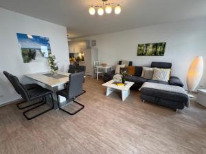 Posezení v ubytování Aquamarin Ostseetraumsuite 02