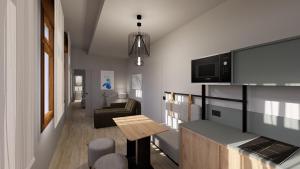 ein Wohnzimmer mit Sofa und Tisch in der Unterkunft Vivit 39 in Venedig