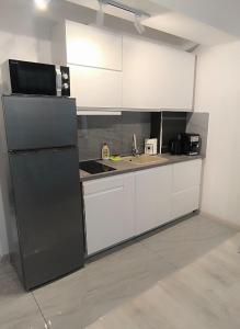 Kuchyň nebo kuchyňský kout v ubytování Studio Nazli - 2 min de plaja