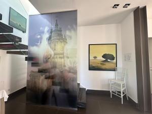 TV a/nebo společenská místnost v ubytování San Giorgio Modica Hotel