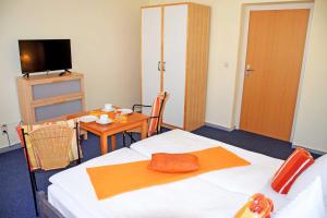 Postel nebo postele na pokoji v ubytování Appartementhaus Sellin