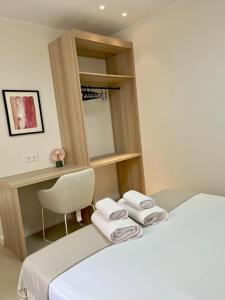 En eller flere senge i et værelse på Osito Hub - Florista