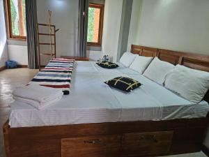 Postel nebo postele na pokoji v ubytování THE HIDEOUT KURUNEGALA