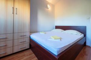 Ένα ή περισσότερα κρεβάτια σε δωμάτιο στο Apartment Pinea